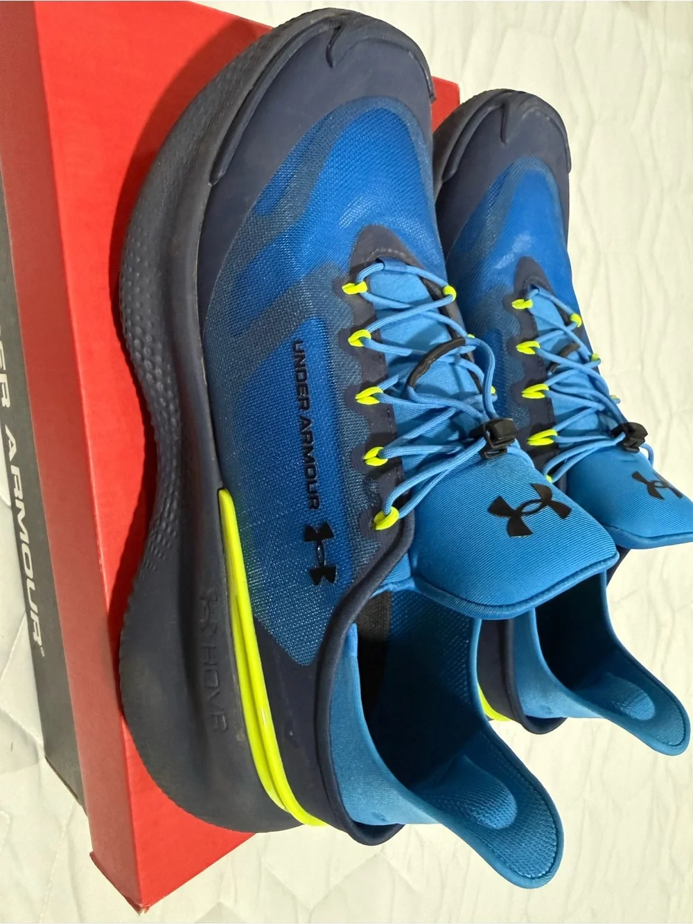 Under Armour Nova Men’s Blue Athletic Running Shoes with Neon Yellow Accents